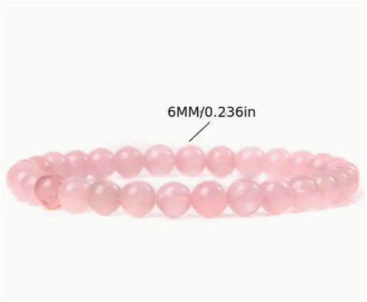 Pulseira Quartzo rosa, esferas de 6mm e 8mm pedras naturais.